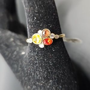 F-3 Goldtone ring with multicored stones